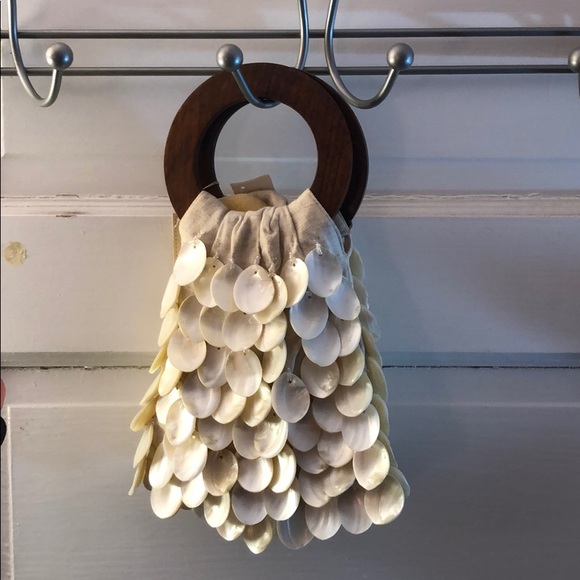 Handbags - Shell-detailed clutch bag
